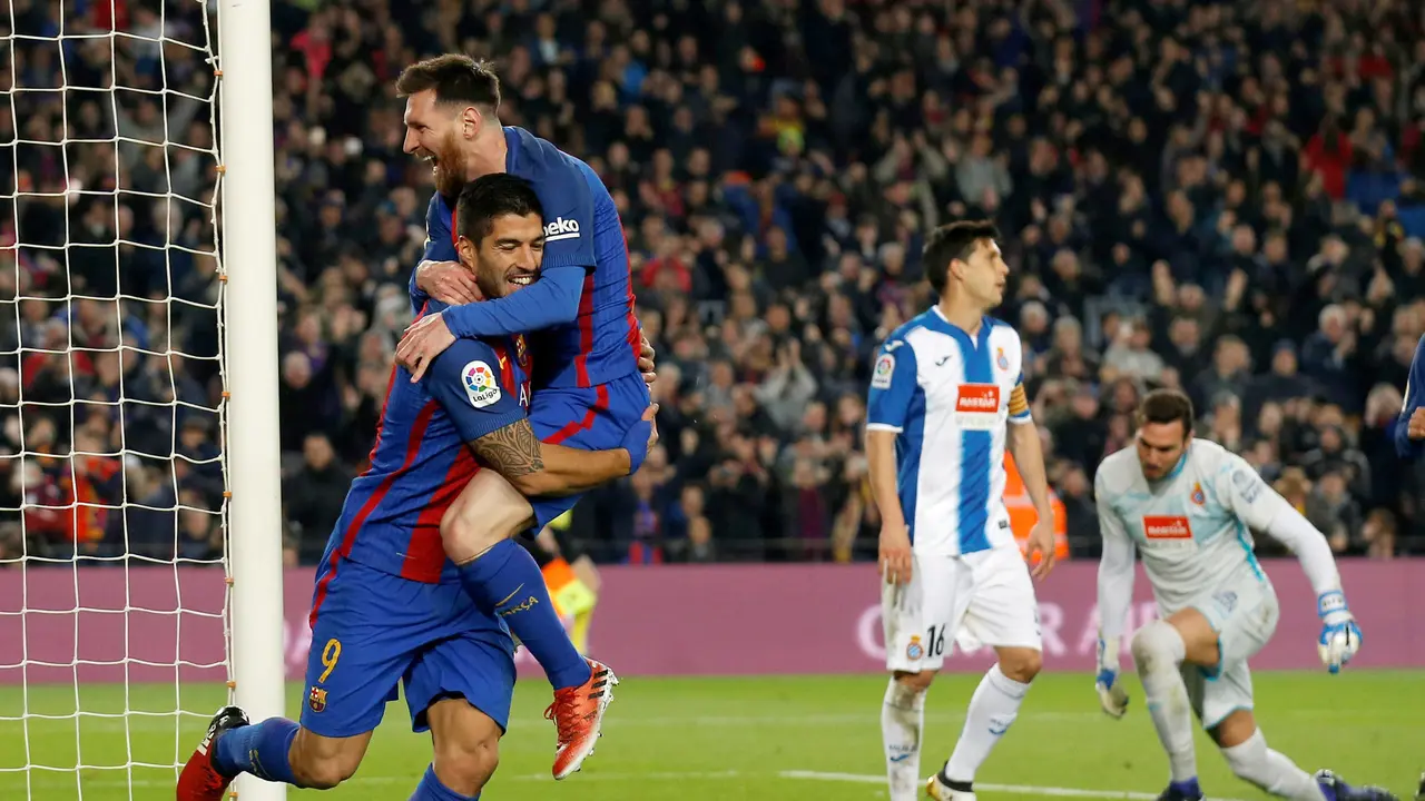 Lionel Messi dan Luis Suarez