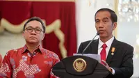 Presiden Jokowi dan Ketua Umum PAN Zulkifli Hasan saat memberikan keterangan pers di Istana (Liputan6.com/ Faizal Fanani)