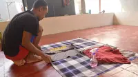 Ganjar Nurdiansyah saat mengerjakan orderan cucian di dalam Lapas Kelas IIA Gorontalo (Arfandi Ibrahim/Liputan6.com)