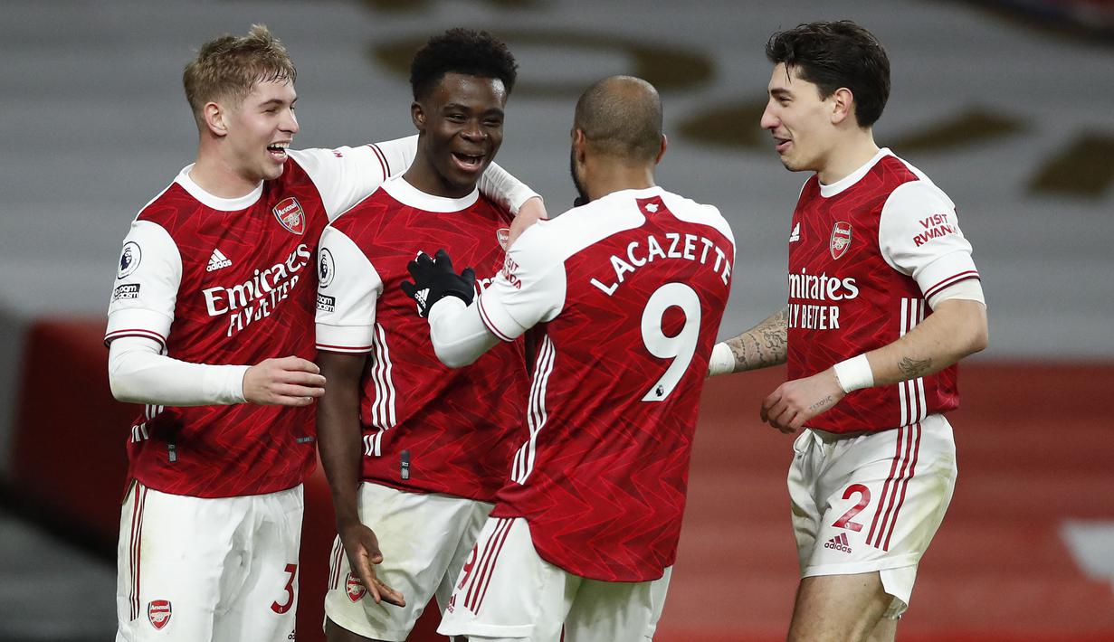 Bukayo Saka merupakan salah satu pemain muda paling impresif di Liga Inggris musim ini. Ia tercatat telah mencetak 7 gol dan 4 assit dalam 22 laga. Liverpool akan menjadi lawan berat Arsenal dan Saka dalam lima pertandingan berikutnya. (AFP/Andrew Boyers)