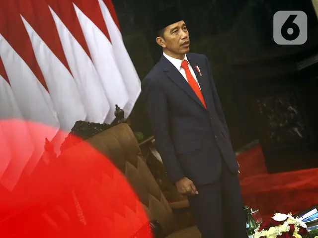 Joko Widodo atau Jokowi saat menghadiri pelantikannya sebagai Presiden RI periode 2019-2024 di Gedung Nusantara, Jakarta, Minggu (20/10/2019). Jokowi dan Ma'ruf Amin resmi dilantik sebagai Presiden dan Wakil Presiden RI periode 2019-2024. (Liputan6.com/JohanTallo)