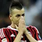 Reaksi gelandang AC Milan Stephan El Shaarawy yang mencetak gol penyeimbang 1-1 saat berhadapan kontra Udinese dalam lanjutan Serie A di San Siro, Milan, 21 September 2011. AFP PHOTO/Filippo MONTEFORTE