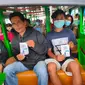 Para penumpang speedboat di Dermaga Pasar Tradisional 16 Ilir Palembang Sumsel, yang antusias mendengarkan sosialisasi terkait Cek Fakta Liputan6.com (Liputan6.com / Nefri Inge)