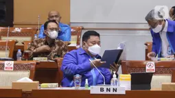 Kepala Badan Narkotika Nasional (BNN) Komjen Pol Petrus Reinhard Golose mengikuti rapat dengar pendapat dengan Komisi III DPR di Kompleks Parlemen, Senayan, Jakarta, Senin (7/6/2021). Rapat membahas penyusunan program kerja tahun 2022. (Liputan6.com/Angga Yuniar)