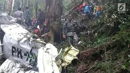 Pesawat Dimonim PK-HVQ yang sempat hilang kontak ditemukan di Kabupaten Pegunungan Bintang, Papua, Minggu (12/8). Pesawat pertama kali ditemukan oleh masyarakat. (Liputan6.com/HO/Humas Polda Papua)