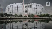 Suasana proyek pembangunan Jakarta Internasional Stadium (JIS), Papanggo, Jakarta Utara, Selasa (11/1/2022). Progres pembangunan stadion terbesar di Asia yang dirancang sesuai standar FIFA tersebut saat ini mencapai 93,85 persen dan ditargetkan rampung Maret mendatang. (merdeka.com/Iqbal S. Nugroho)