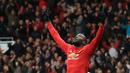 Pemain Manchester United, Romelu Lukaku membuka keunggulan timnya dengan gol cepat pada menit ke-5’ saat melawan Swansea City pada lanjutan Premier League di Old Trafford, Manchester, (31/3/2018). MU menang dengan skor 2-0. (AFP/Lindsey Parnaby)