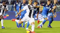 Cristiano Ronaldo mencetak dua gol saat Juventus mengalahkan Empoli 2-1 dalam laga lanjutan Serie A. (Fabio Muzzi/ANSA via AP)