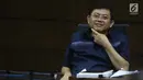 Terdakwa dugaan menghalangi proses penyidikan KPK terhadap Eddy Sindoro, Lucas saat menjalani sidang di Pengadilan Tipikor Jakarta, Kamis (10/1). Sidang mendengar keterangan saksi termasuk penyidik KPK, Novel Baswedan. (Liputan6.com/Helmi Fithriansyah)