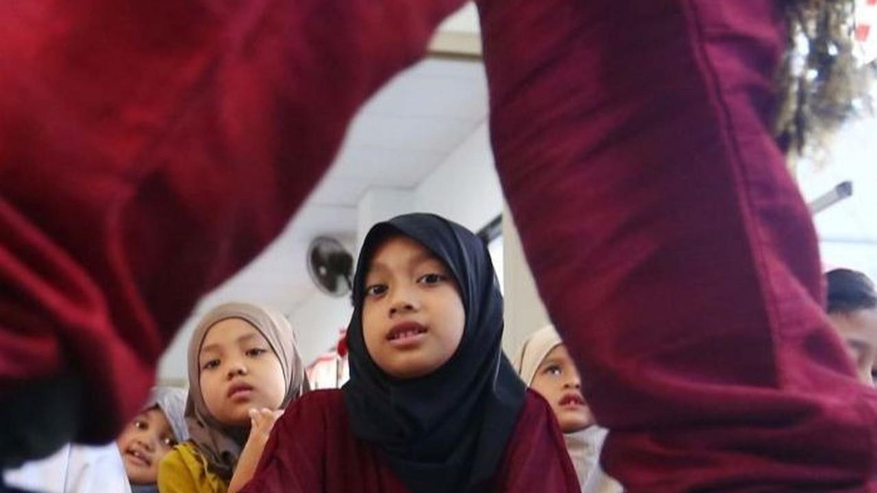 Seorang murid saat mendengarkan dakwa ustaz Yahya Edward Hendrawan. Foto: Liputan6.com / Angga Yuniar