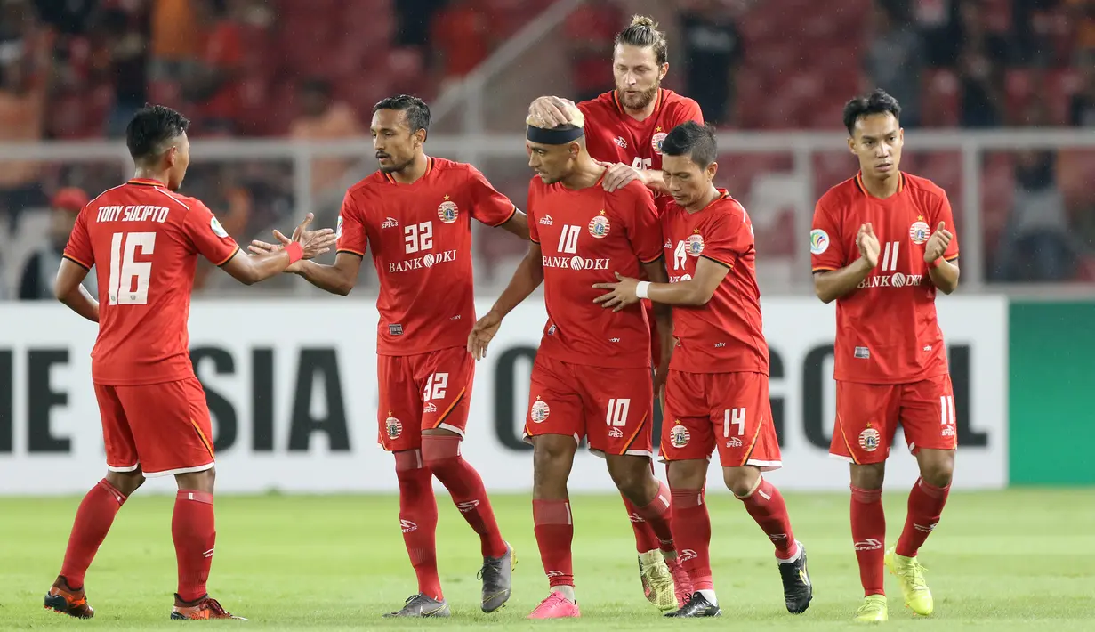 Para pemain Persija Jakarta merayakan gol yang dicetak oleh Bruno Matos ke gawang Shan United pada laga Piala AFC 2019 di SUGBK, Jakarta, Rabu (15/5). (Bola.com/M Iqbal Ichsan)