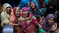 Sejumlah wanita meratapi kerabat mereka yang tewas dalam kerusuhan di New Delhi, India, Sabtu (29/2/2020). Jumlah korban tewas dalam aksi kekerasan komunal di New Delhi bertambah menjadi 42 orang. (Xinhua/Javed Dar)