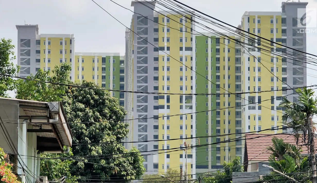 Pemandangan proyek Rusunawa Pasar Rumput yang hampir selesai pengerjaannya di Jakarta, Selasa (16/7/2019). Rusunawa Pasar Rumput akan diresmikan oleh Presiden Joko Widodo atau Jokowi pada Agustus mendatang. (Liputan6.com/Immanuel Antonius)