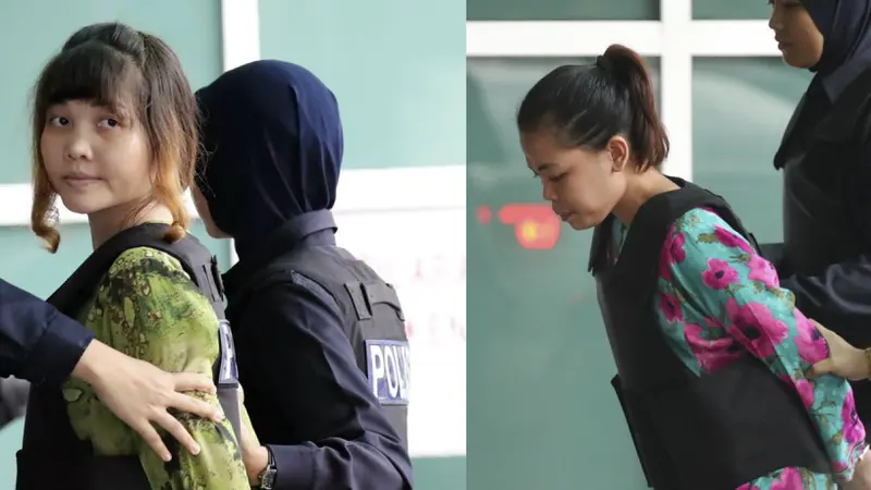 (kanan) Doan Thi Huong dan (kiri) Siti Aisyah menuju laboratorium di Kuala Lumpur, Malaysia untuk pengecekan racun VX Nerve Agent yang digunakan untuk membunuh Kim Jong-nam. (AP Photo/Vincent Thian)