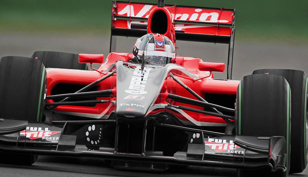 Pada tahun 2010 Manor mulai beraksi di ajang Formula 1, saat itu mereka memakai nama Virgin Racing, sesuai dengan nama sponsor. (EPA/Diego Azubel)