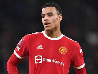 Pemain MU, Mason Greenwood menjadi pesepak bola teranyar yang sempat dipenjara akibat tindak kriminal. Sebelumnya, telah banyak kasus yang mengharuskan pesepak bola mendekam dalam jeruji besi untuk mempertanggung jawabkan perbuatan kriminalnya. siapa saja? (AFP/Paul Ellis)