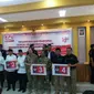 Empat paslon Pilkada Palembang mendapatkan nomor urut dengan pengawalan ketat pihak kepolisian (Liputan6.com / Nefri Inge)