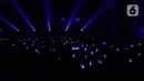 Penyanyi asal Korea Selatan, Taeyeon menggelar konser solonya bertema Taeyeon Concerts - The Odd of Love in Jakarta di Indonesia Convention Exhibition (ICE), BSD City, Tangerang Selatan, Banten, Sabtu (22/7/2023). (Liputan6.com/Helmi Fithriansyah)
