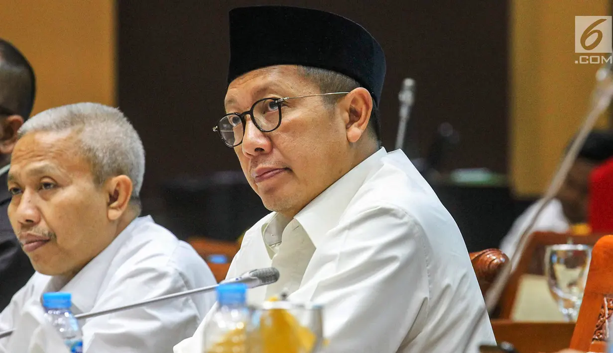 Menteri Agama Lukman Hakim Saifuddin saat mengikuti Rapat Dengar Pendapat (RDP) dengan Komisi VIII DPR RI di Kompleks Parlemen, Senayan, Jakarta, Selasa (23/4). RDP tersebut membahas penambahan jumlah kuota haji tahun 1440 H/ 2019 M. (Liputan6.com/Johan Tallo)