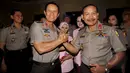 Mantan Kapolri Jenderal Pol. Sutarman (kiri) bersama Plt. Kapolri Komjen Pol. Badrodin Haiti (kanan) saat menghadiri upacara Penyerahan Tugas Wewenang dan Tanggung Jawab Kapolri, Jakarta, Rabu (21/1/2015). (Liputan6.com/Miftahul Hayat)
