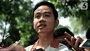 Putra Presiden Joko Widodo, Gibran Rakabuming Raka memberikan keterangan seusai bertemu Ketum PDIP Megawati Soekarnoputri di Jalan Teuku Umar, Jakarta, Kamis (24/10/2019). Kedatangan Gibran menyampaikan ihwal niat maju dalam pencalonan Wali Kota Solo melalui jalur partai. (merdeka.com/Iqbal Nugroho)