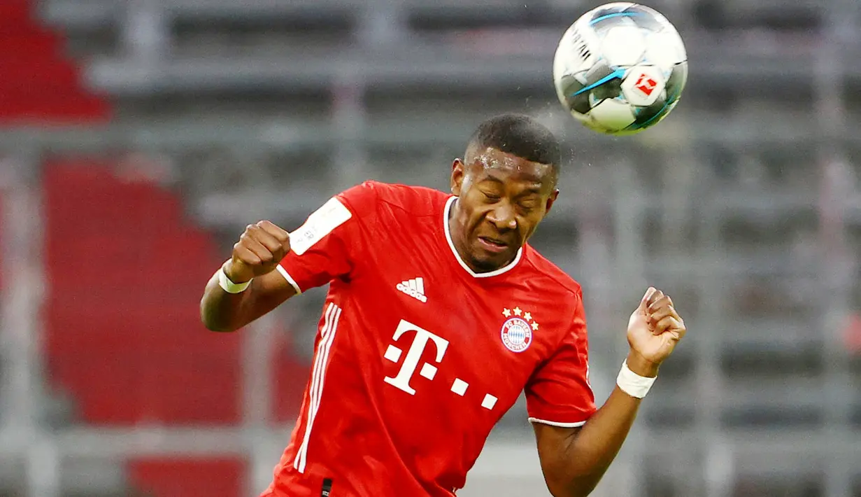 David Alaba - Jebolan akademi Bayern Munchen ini sukses mempersembahkan treble sebanyak dua kali untuk Die Roten. Pemain berkebangsaan Austria itu menjadi andalan sekaligus kunci di sektor kiri lini pertahanan. (AFP/Pool/Kai Pfaffenceach)