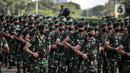 Prajurit TNI AD mengikuti Apel Gelar Pasukan Jajaran TNI AD di Lapangan Monas, Jakarta, Selasa (25/1/2022). Pasukan TNI AD dan Alutsista dipamerkan saat mengikuti gelar apel pasukan. (Liputan6.com/Faizal Fanani)
