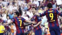 Lionel Messi rayakan gol Pedro ke gawang Sociedad (QUIQUE GARCIA / AFP)