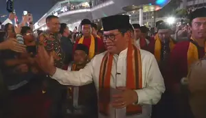 Momen Pramono-Rano Diiringi Tanjidor Hadiri Puncak HUT Jakarta