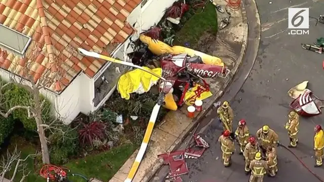 Sebuah helikopter jatuh dan menghantam sebuah rumah di Pantai Newport, California, Amerika Serikat.