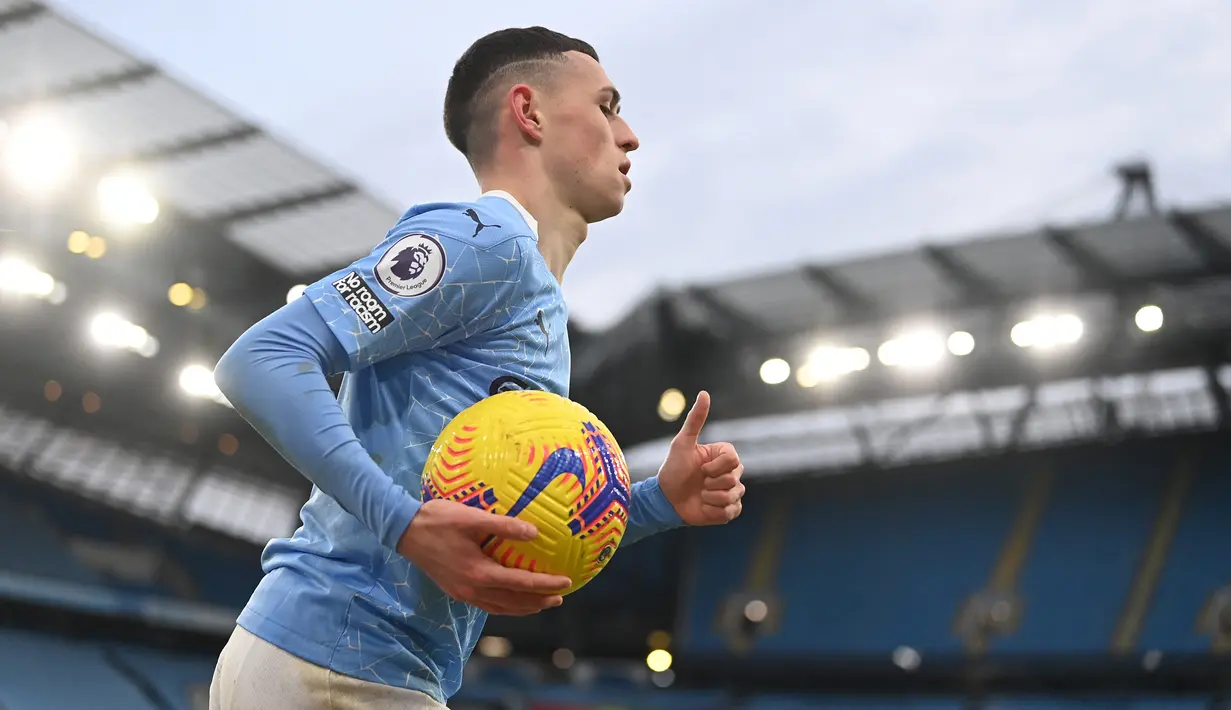 1. Phil Foden (Manchester City). Saat menjadi anak gawang di akademi Manchester City, ia terinspirasi Stevan Jovetic saat berselebrasi melawan Swansea pada 2014. Kini impiannya terwujud setelah berhasil menembus tim inti di skuat Manchester City. (AFP/Laurence Griffiths/Pool)