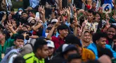 Massa pendukung Prabowo-Gibran saat melakukan aksi unjuk rasa di kawasan Patung Kuda, Jakarta Pusat, Jumat (19/4/2024). (Liputan6.com/Angga Yuniar)