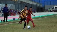 Duel Laos vs Malaysia di matchday terakhir penyisihan Grup B Piala AFF U-16 2018 di Stadion Gelora Joko Samudro, Gresik, Selasa (7/8/2018). (Bola.com/Zaidan Nazarul)