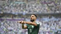 Saleh Al-Shehri dari Arab Saudi merayakan golnya ke gawang Argentina pada pertandingan pembuka Grup C Piala Dunia 2022 Qatar di Stadion Lusail, Lusail, Selasa, 22 November 2022. (AP Photo/Jorge Saenz)