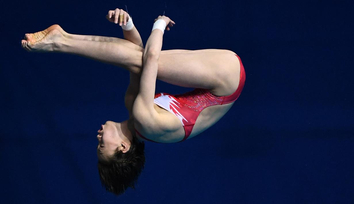 Chen Yuxi. Atlet loncat indah putri Cina berusia 15 tahun ini akan menjadi andalan untuk meraih medali emas di nomor papan 10 meter. Ia juga berstatus sebagai juara dunia untuk nomor papan 10 meter pada kejuaraan dunia tahun 2019. (Foto: AFP/Ed Jones)