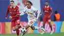 Hingga akhir pertandingan, tidak ada gol tambahan. Skor 1-0 untuk kemenangan Liverpool bertahan hingga peluit akhir dibunyikan. (Ronny HARTMANN/AFP)