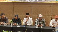 Tim pemenangan paslon nomor urut satu Imam-Ririn memberikan pernyataan kemenangan pada Pilkada Depok 2024 berdasarkan data internal PKS. (Liputan6.com/Dicky Agung Prihanto)