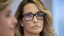 Bintang film porno, Jessica Drake berbicara dihadapan awak media dalam jumpa pers di Los Angeles, California, Sabtu (22/10). Jessica Drake adalah perempuan ke-11 yang menuding perilaku tak wajar Donald Trump. (David McNew/Getty Images/AFP)