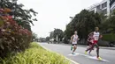 Pelari Indonesia, Agus Prayogo, berlari saat tampil pada nomor marathon SEA Games di Putrajaya, Kuala Lumpur, Sabtu (19/8/2017). Agus meraih medali perak dengan waktu dua jam 27 menit 16 detik. (Bola.com/Vitalis Yogi Trisna)
