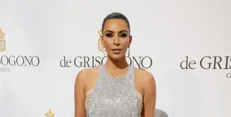 Kim Kardashian, istri dari rapper Kanye West, memang sangat dikenal dengan imej seksinya. Bokong besar Kim Kardashian merupakan ciri khasnya. (AFP/Bintang.com)