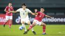 <p>Pemain Timnas Indonesia U-19,&nbsp;Arkhan Fikri&nbsp;berebut bola dengan pemain Timnas Thailand U-19, Sittha Boonlha dalam pertandingan babak penyisihan Grup A Piala AFF U-19 yang berlangsung di Stadion Patriot Candrabhaga, Bekasi, Rabu (6/7/2022). (Bola.com/Bagaskara Lazuardi)</p>