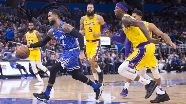 Aksi point guard Magic DJ Augustin saat melawan Lakers di ajang NBA