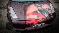 Lamborghini Gallardo akan memperlihatkan cat bergambar Captain America saat disiram air hangat (Foto: Carscoops). 