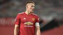 Scott McTominay pantas sebagai kandidat kapten Manchester United menggantikan Harry Maguire. Selain mampu tampil solid di lini tengah, McTominay merupakan sosok yang terbuka dan jujur, serta sebagai pembicara yang cerdas dan berpengaruh besar. (AFP/Oli Scarff)