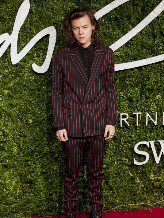Harry Styles dan personel One Direction lainnya kini dikabarkan akan ‘break’ sementara dan menjalani solo karier. (Bintang/EPA)