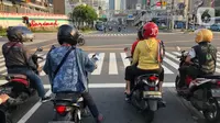 Sebagai pusat perekonomian dan bisnis di Indonesia, Jakarta terus berupaya mengatasi permasalahan kemacetan yang semakin meningkat, salah satunya ganjil genap. (Liputan6.com/Immanuel Antonius)