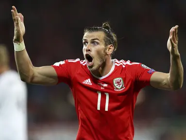 Ekspresi Gareth Bale saat melawan Austria pada laga Group D kualifikasi Piala Dunia 2018 di Cardiff City Stadium, Cardiff, (2/8/2017). Wales menang 1-0. (David Davies/PA via AP)