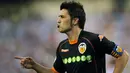 Gaya striker Valencia, David Villa seusai mencetak gol ke gawang Real Valladolid dalam lanjutan La Liga yang berlangsung di Jose Zorrilla Stadium, 13 September 2009. Valencia unggul 4-2. AFP PHOTO/Pedro ARMESTRE. 