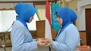 Citizen6, Surabaya: Ketua Cabang 2 Jalasenastri  Kobangdikal diserah terimakan dari Ny.Yayat Achmad Hadirat kepada Ny. Aswad di Ruang Joglo Muljadi Kesatrian Bumimoro Kobangdikal, Selasa (30/10). (Pengirim: Penkobangdikal). 
