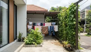 8 Desain Area Jemur Tersembunyi di Samping Rumah agar Tidak Terlihat dari Jalan